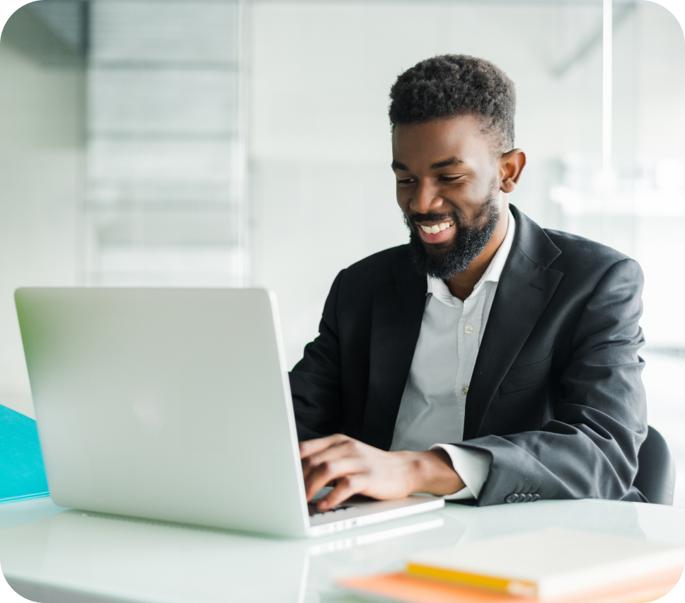 Thoughtful African American businessman using laptop